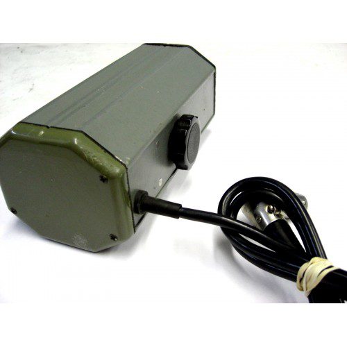 A green box with a cord attached to it.