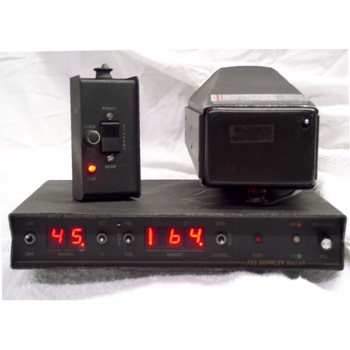 A black box with red lights and a remote control