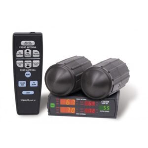 A remote control and two speakers on top of each other.