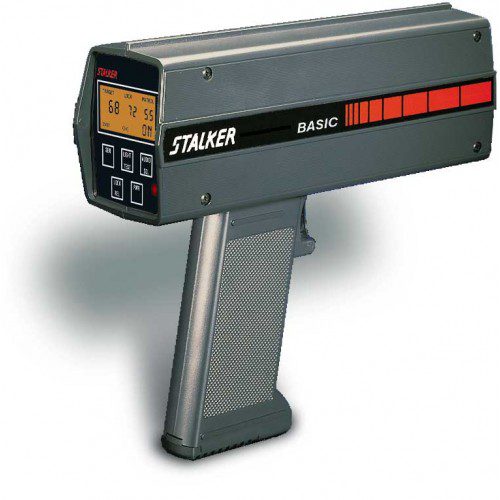 A gray and red handheld gun with the word stalker on it.