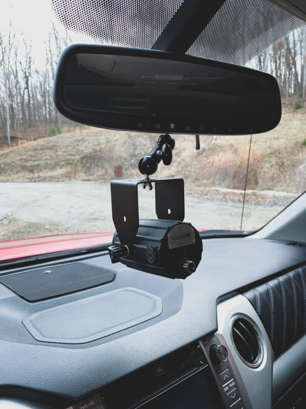 A car dashboard with the camera mounted to it.