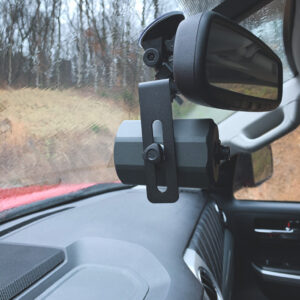 A car mirror with the camera on it.