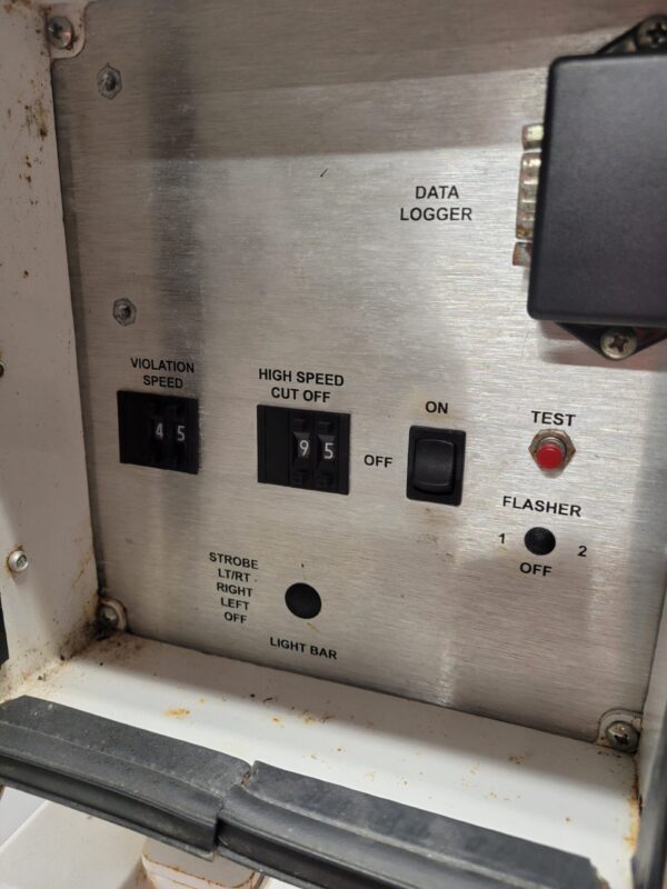 A close up of the electrical panel on an old machine
