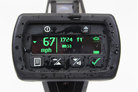 A gps device with the speed and time displayed.